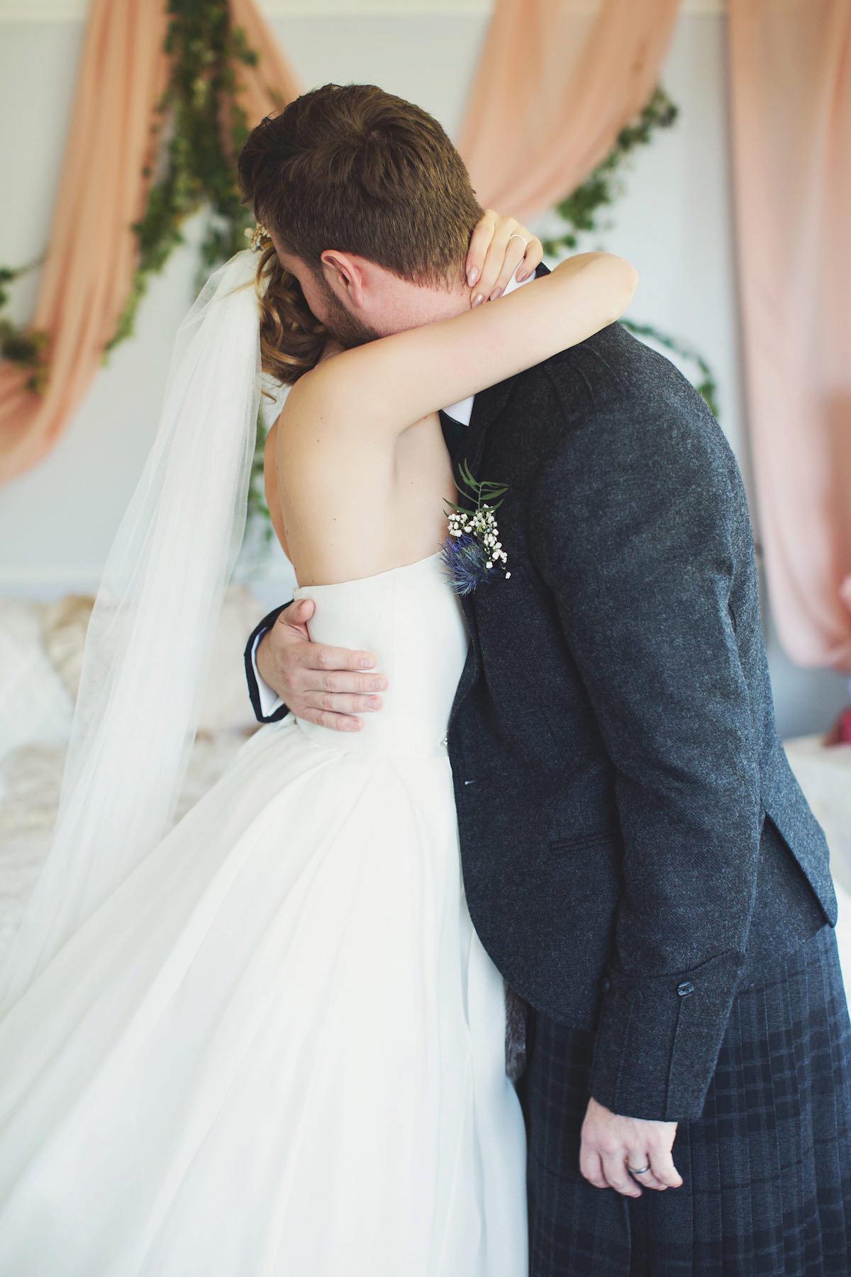 Anastasia wore a Jesus Peiro gown and Badgley Mischka shoes for her feminine, romantic and elegant country house wedding in Autumn.