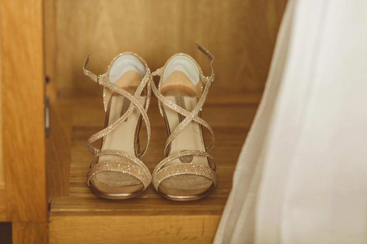 Bride Anna wore a feminine and bohemian inspired Rembo Styling dress for her wedding at her husbands family home in Devon. Photography by Jay Rowden.