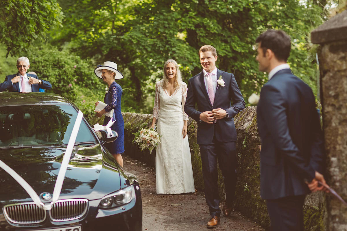 Bride Anna wore a feminine and bohemian inspired Rembo Styling dress for her wedding at her husbands family home in Devon. Photography by Jay Rowden.