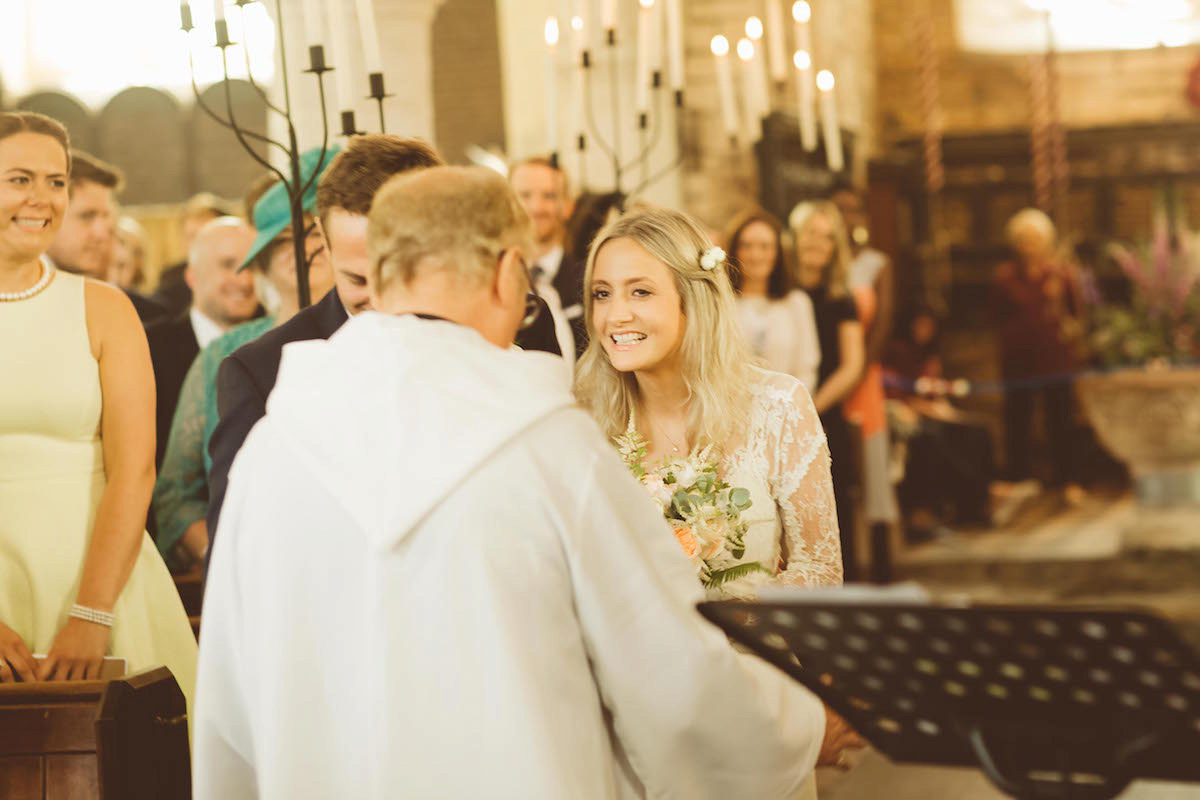 Bride Anna wore a feminine and bohemian inspired Rembo Styling dress for her wedding at her husbands family home in Devon. Photography by Jay Rowden.