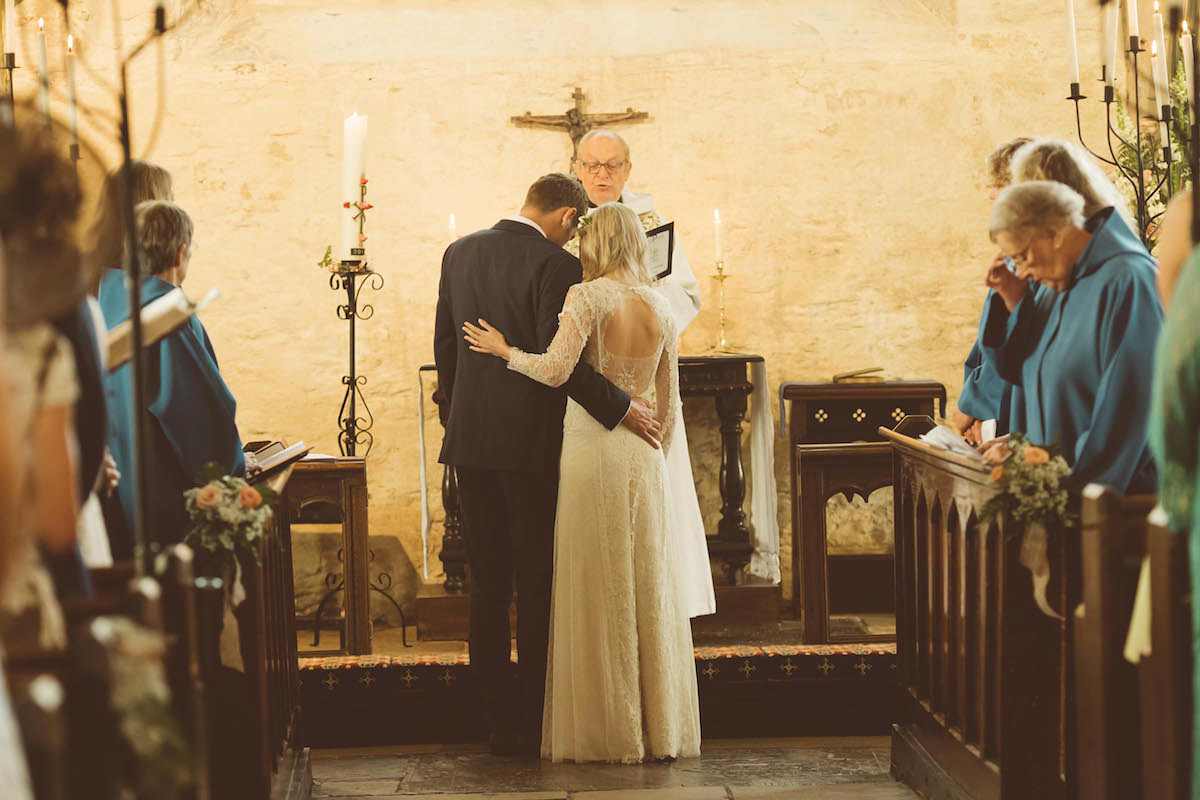 Bride Anna wore a feminine and bohemian inspired Rembo Styling dress for her wedding at her husbands family home in Devon. Photography by Jay Rowden.