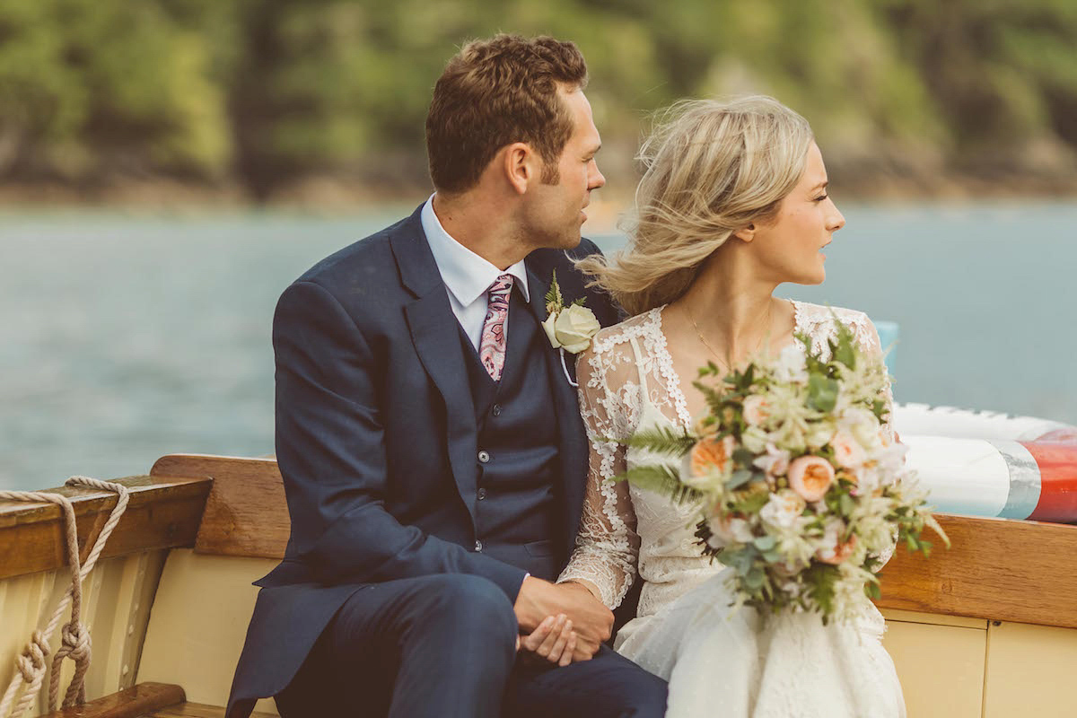 Bride Anna wore a feminine and bohemian inspired Rembo Styling dress for her wedding at her husbands family home in Devon. Photography by Jay Rowden.