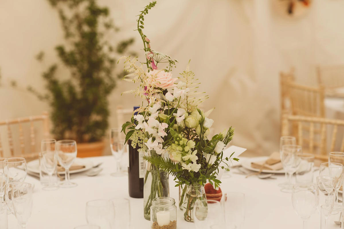 Bride Anna wore a feminine and bohemian inspired Rembo Styling dress for her wedding at her husbands family home in Devon. Photography by Jay Rowden.