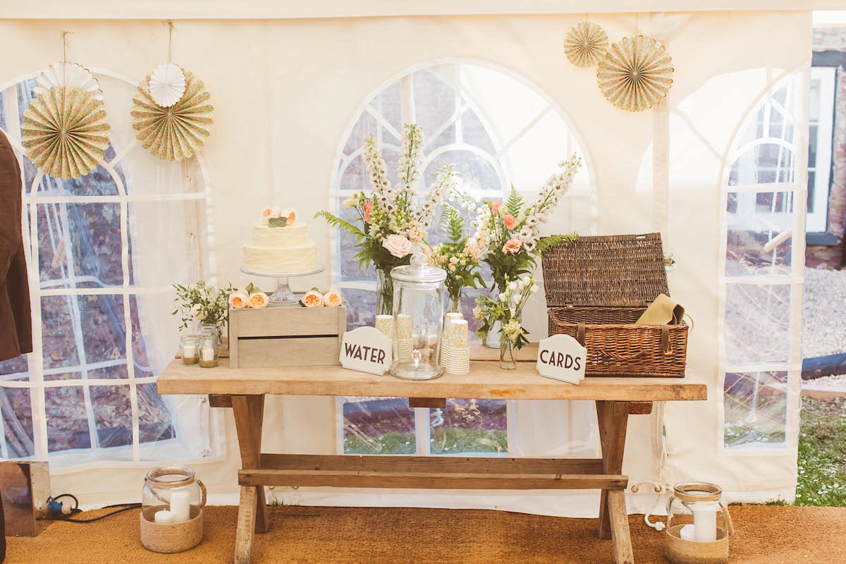 Bride Anna wore a feminine and bohemian inspired Rembo Styling dress for her wedding at her husbands family home in Devon. Photography by Jay Rowden.