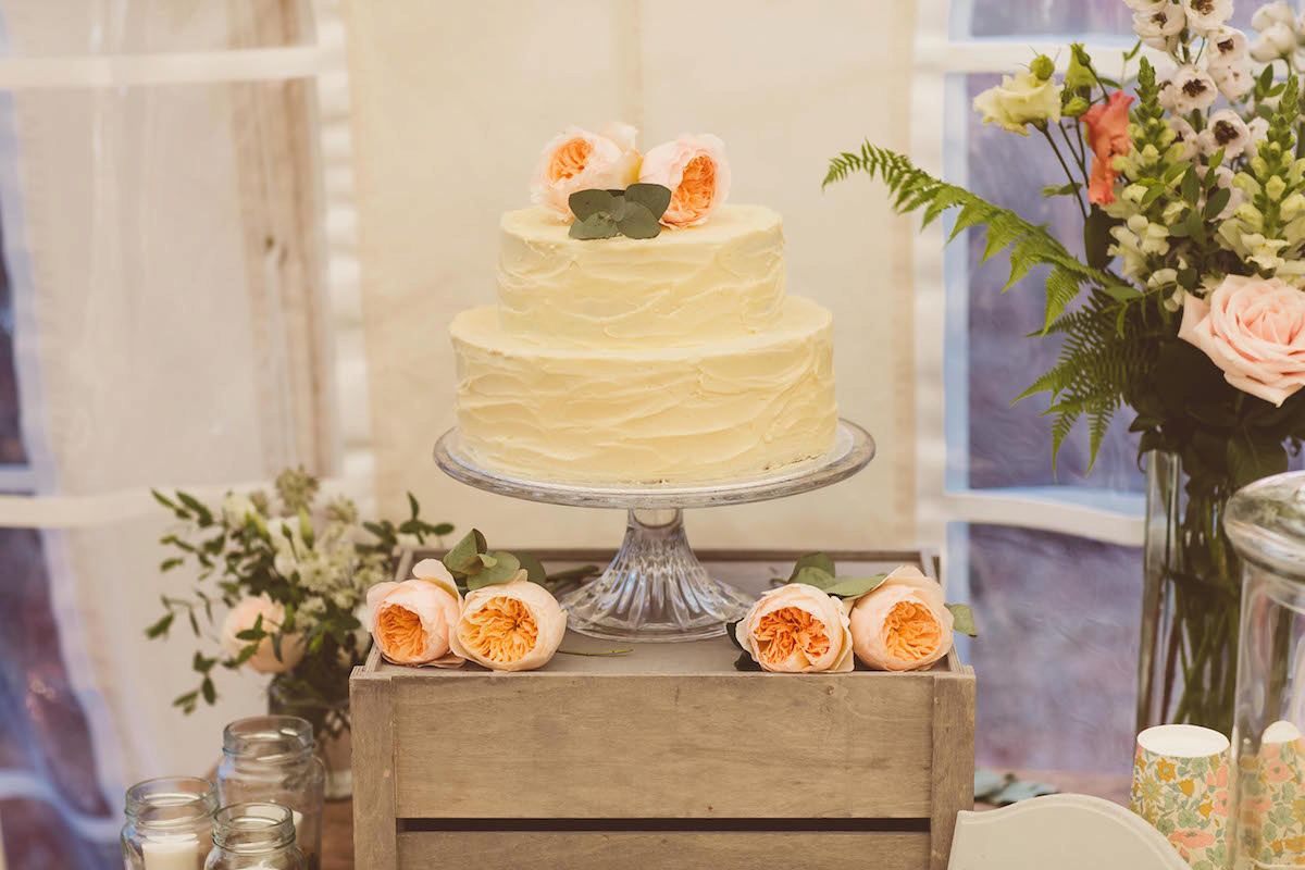 Bride Anna wore a feminine and bohemian inspired Rembo Styling dress for her wedding at her husbands family home in Devon. Photography by Jay Rowden.