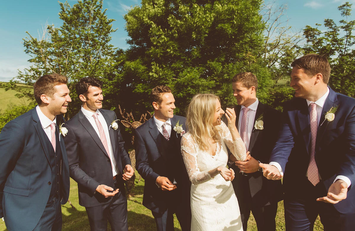 Bride Anna wore a feminine and bohemian inspired Rembo Styling dress for her wedding at her husbands family home in Devon. Photography by Jay Rowden.