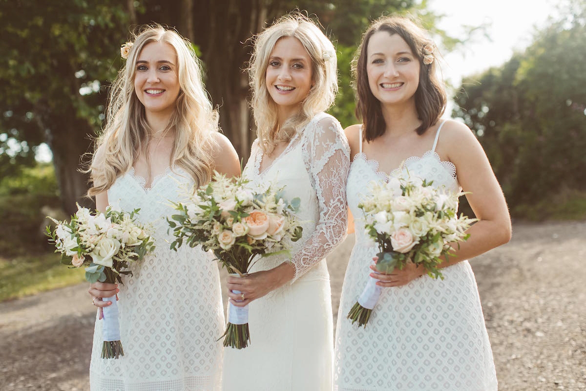 Bride Anna wore a feminine and bohemian inspired Rembo Styling dress for her wedding at her husbands family home in Devon. Photography by Jay Rowden.