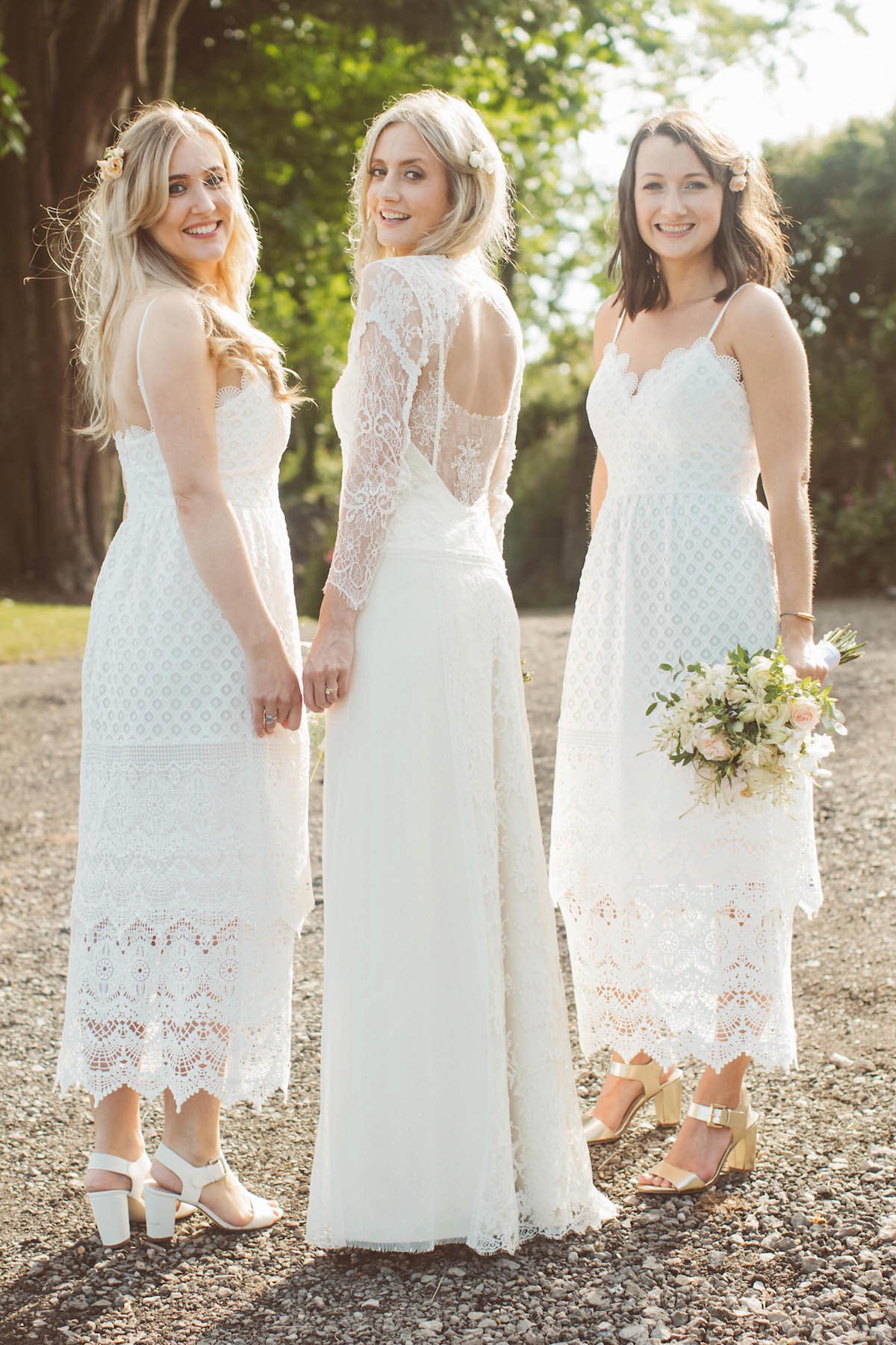 Bride Anna wore a feminine and bohemian inspired Rembo Styling dress for her wedding at her husbands family home in Devon. Photography by Jay Rowden.