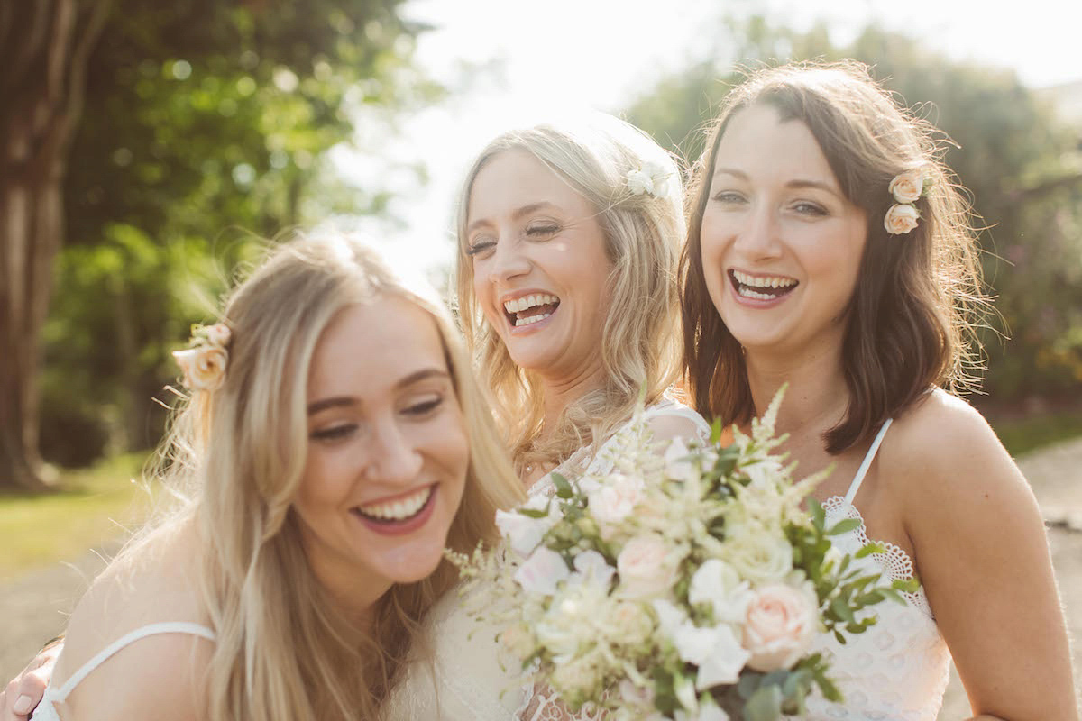 Bride Anna wore a feminine and bohemian inspired Rembo Styling dress for her wedding at her husbands family home in Devon. Photography by Jay Rowden.