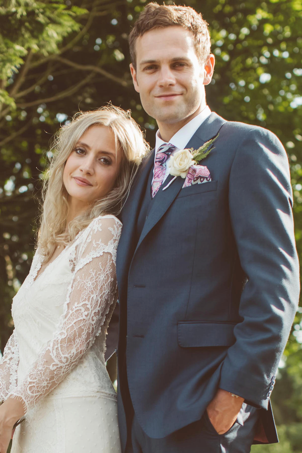 Bride Anna wore a feminine and bohemian inspired Rembo Styling dress for her wedding at her husbands family home in Devon. Photography by Jay Rowden.