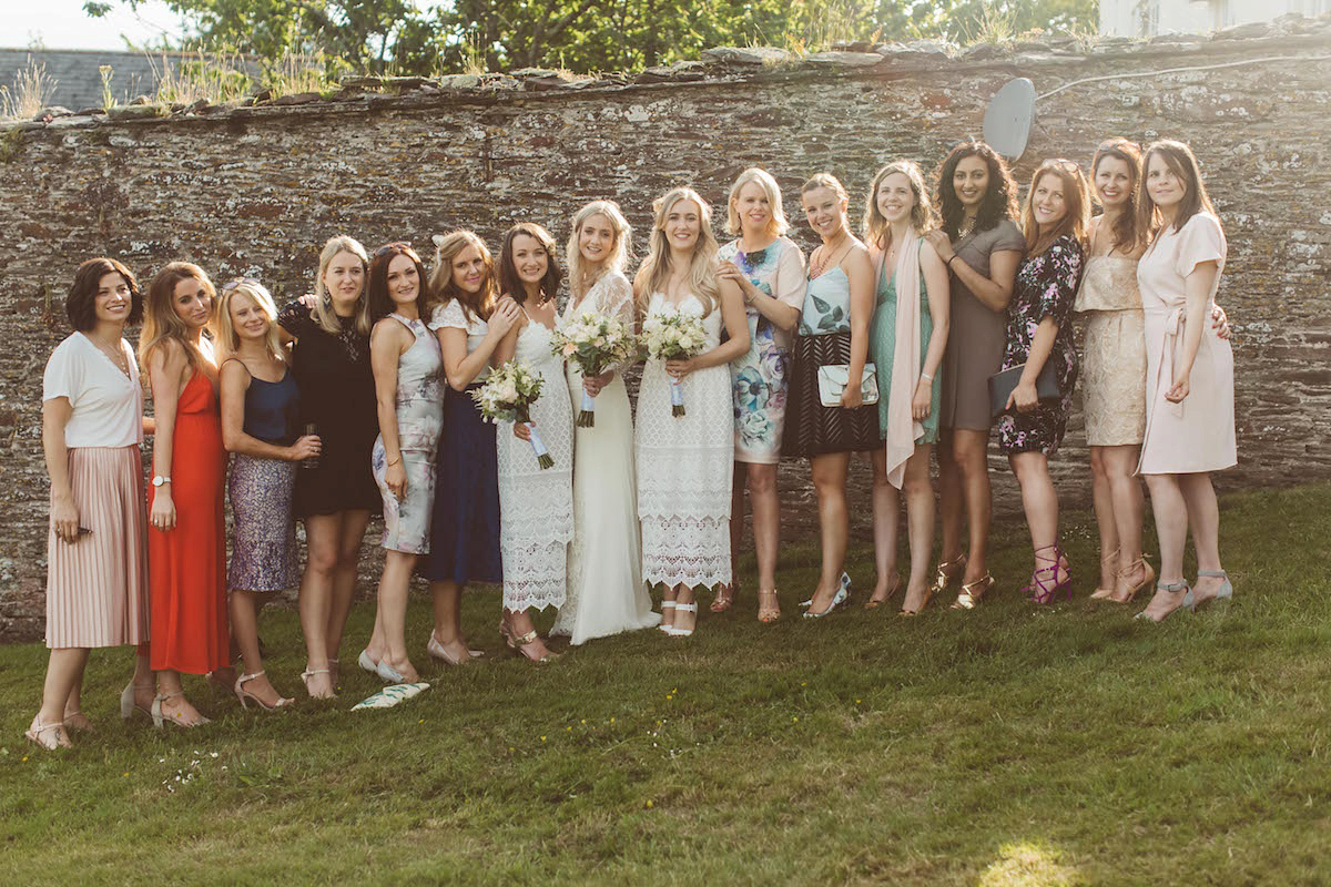 Bride Anna wore a feminine and bohemian inspired Rembo Styling dress for her wedding at her husbands family home in Devon. Photography by Jay Rowden.