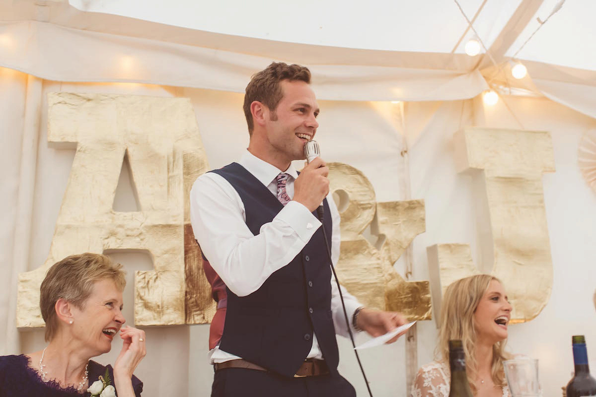 Bride Anna wore a feminine and bohemian inspired Rembo Styling dress for her wedding at her husbands family home in Devon. Photography by Jay Rowden.