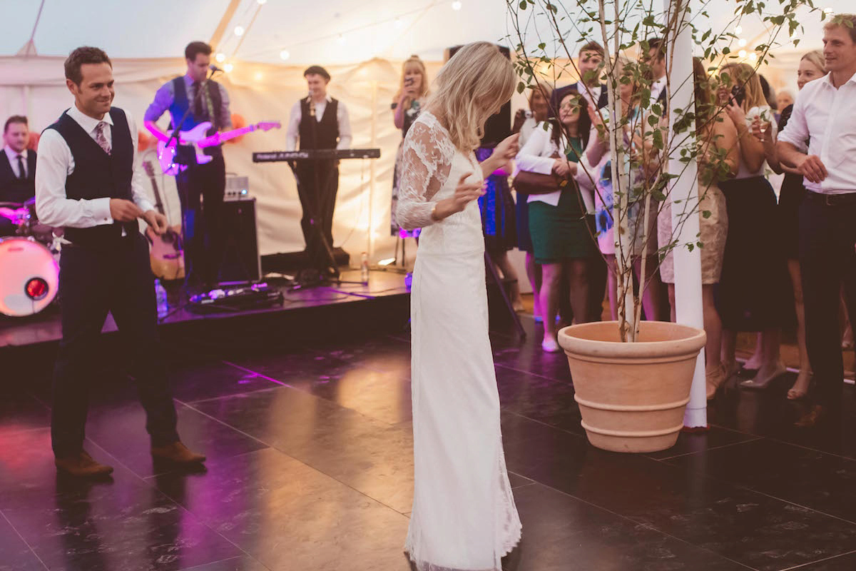 Bride Anna wore a feminine and bohemian inspired Rembo Styling dress for her wedding at her husbands family home in Devon. Photography by Jay Rowden.