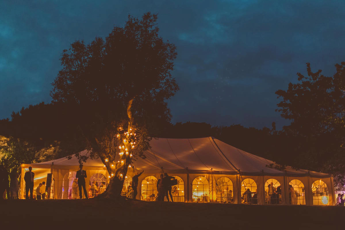 Bride Anna wore a feminine and bohemian inspired Rembo Styling dress for her wedding at her husbands family home in Devon. Photography by Jay Rowden.