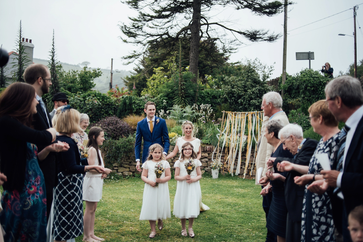 Mel wore two Belle & Bunty gowns for her English country garden wedding in Cornwall. Photography by Liberty Pearl.