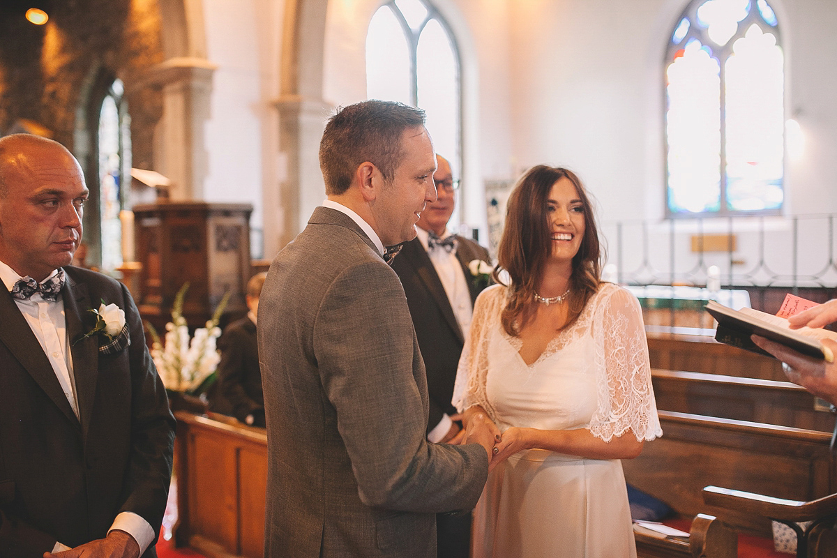 Bride Joanna wore an elegant Kate Beaumont gown for her modern, industrial chic style, minimalist and fuss-free wedding. Photography by Rosie Hardy.