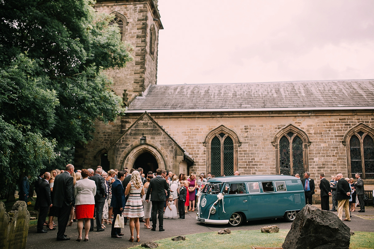 Bride Joanna wore an elegant Kate Beaumont gown for her modern, industrial chic style, minimalist and fuss-free wedding. Photography by Rosie Hardy.