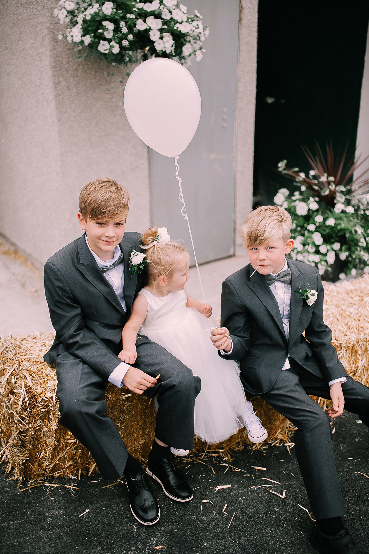 Bride Joanna wore an elegant Kate Beaumont gown for her modern, industrial chic style, minimalist and fuss-free wedding. Photography by Rosie Hardy.