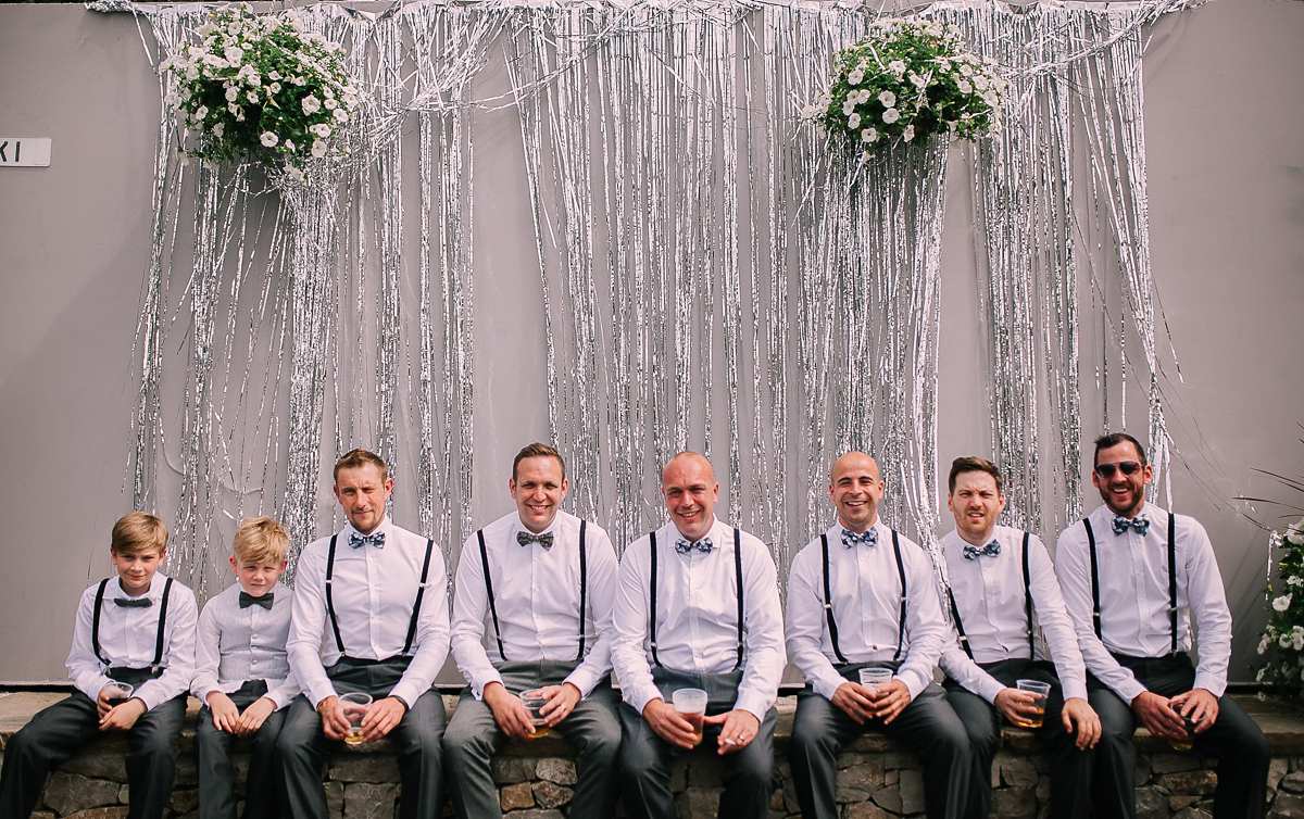 Bride Joanna wore an elegant Kate Beaumont gown for her modern, industrial chic style, minimalist and fuss-free wedding. Photography by Rosie Hardy.