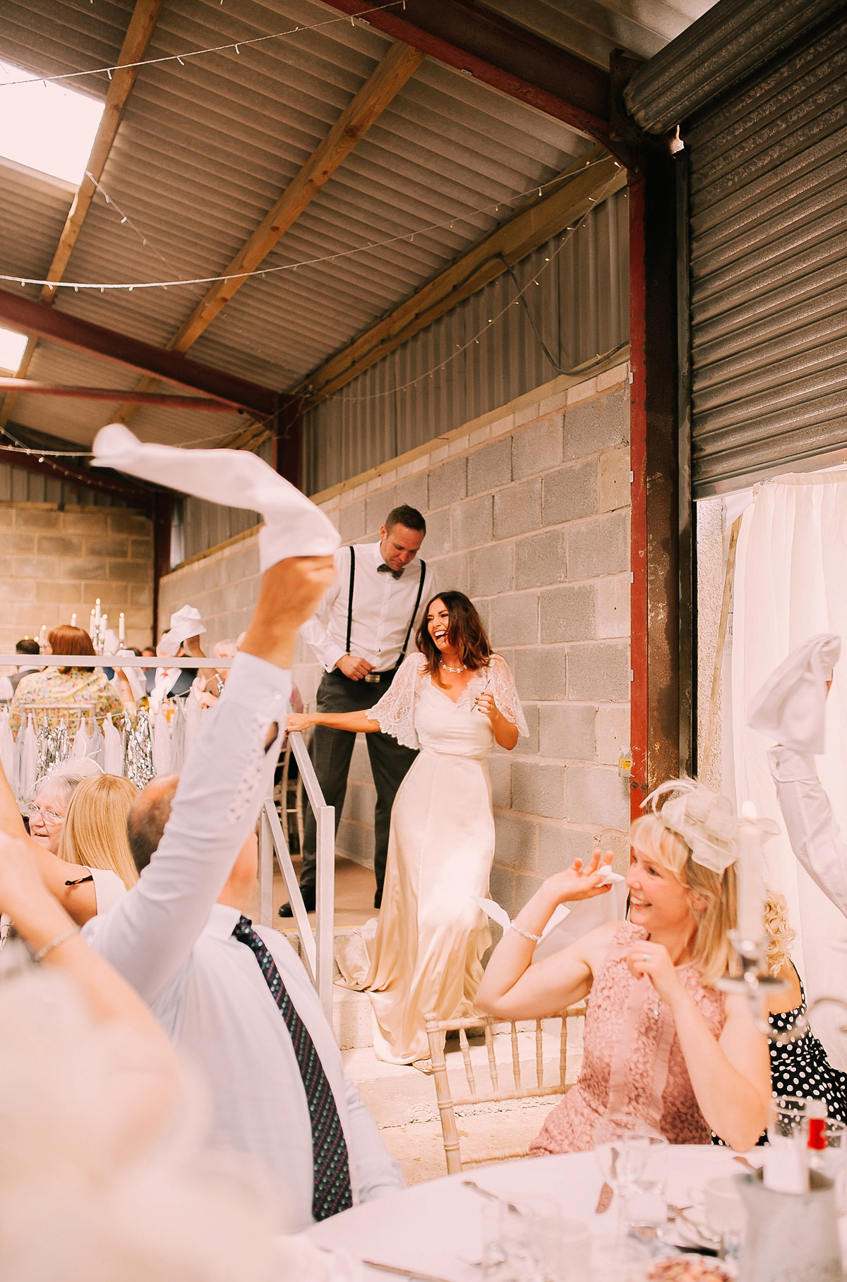 Bride Joanna wore an elegant Kate Beaumont gown for her modern, industrial chic style, minimalist and fuss-free wedding. Photography by Rosie Hardy.