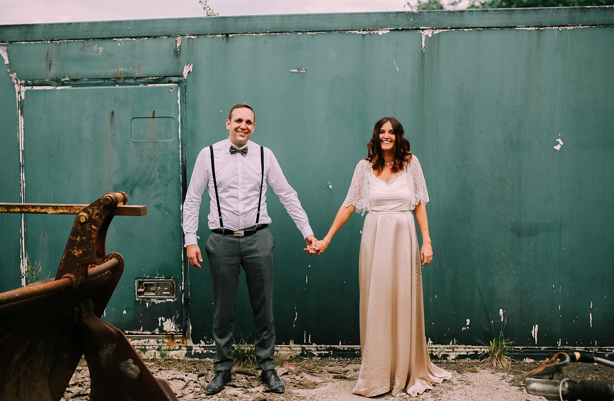 Bride Joanna wore an elegant Kate Beaumont gown for her modern, industrial chic style, minimalist and fuss-free wedding. Photography by Rosie Hardy.