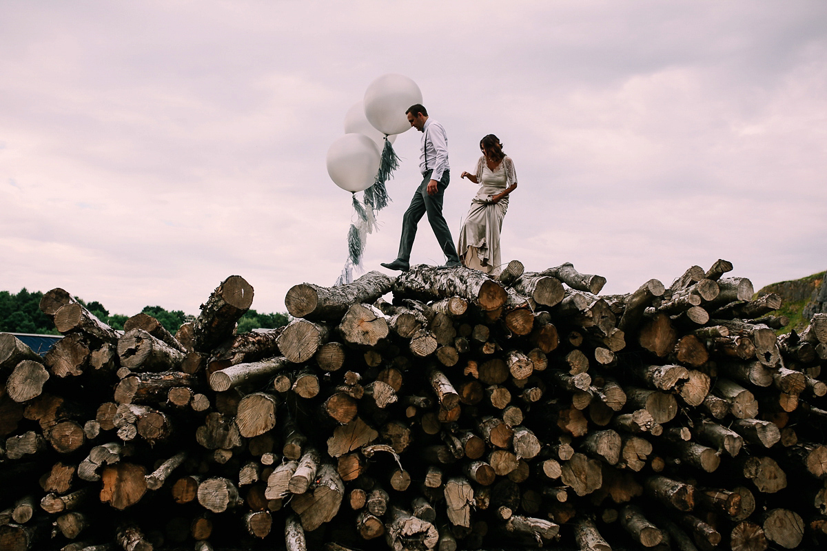 Bride Joanna wore an elegant Kate Beaumont gown for her modern, industrial chic style, minimalist and fuss-free wedding. Photography by Rosie Hardy.