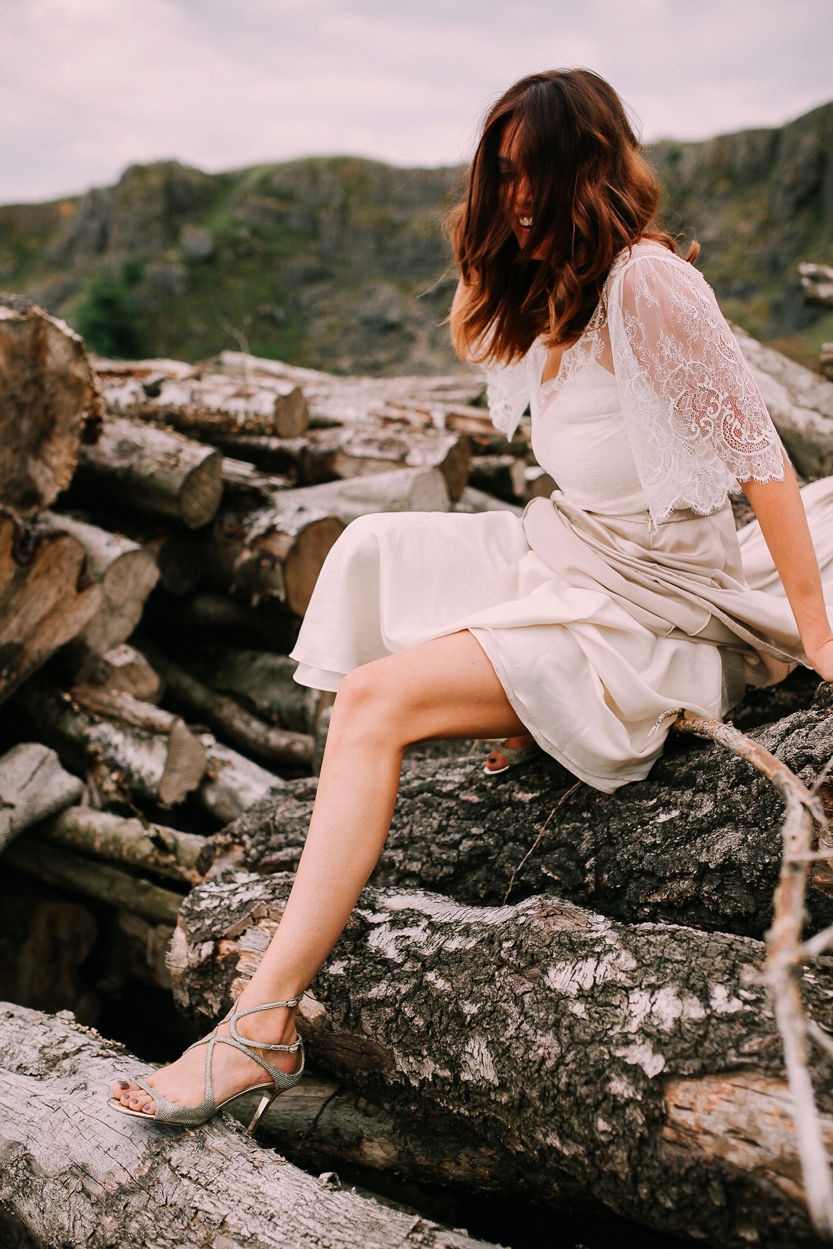 Bride Joanna wore an elegant Kate Beaumont gown for her modern, industrial chic style, minimalist and fuss-free wedding. Photography by Rosie Hardy.