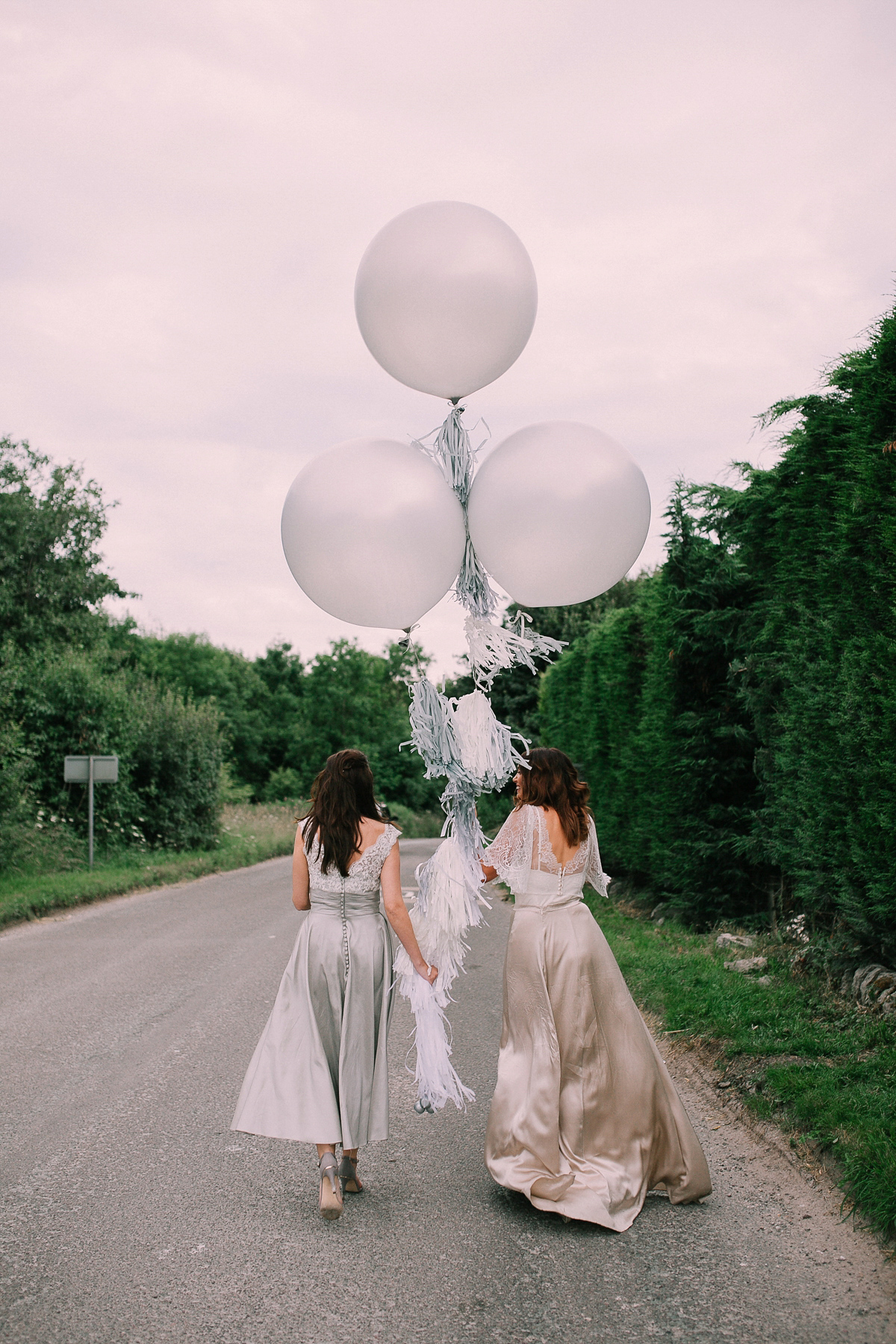 Bride Joanna wore an elegant Kate Beaumont gown for her modern, industrial chic style, minimalist and fuss-free wedding. Photography by Rosie Hardy.