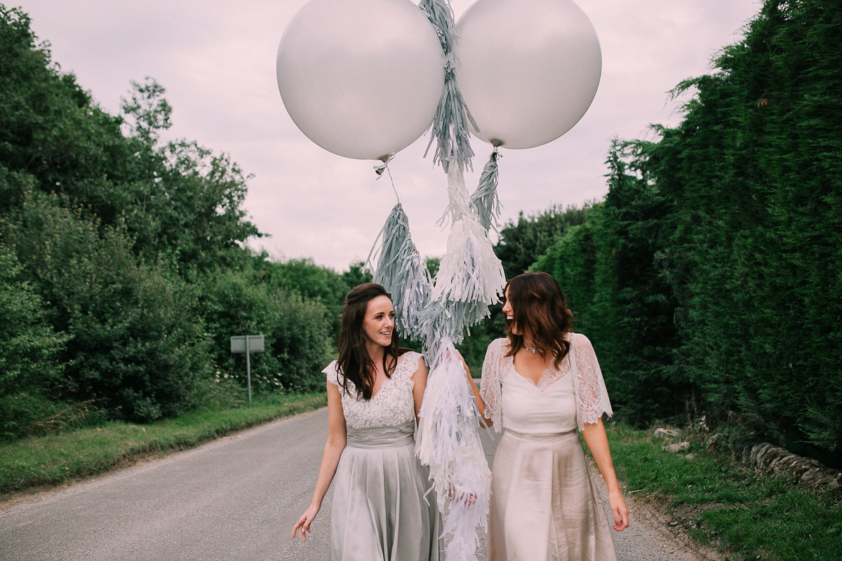 Bride Joanna wore an elegant Kate Beaumont gown for her modern, industrial chic style, minimalist and fuss-free wedding. Photography by Rosie Hardy.