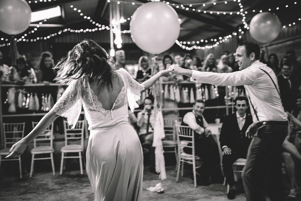 Bride Joanna wore an elegant Kate Beaumont gown for her modern, industrial chic style, minimalist and fuss-free wedding. Photography by Rosie Hardy.