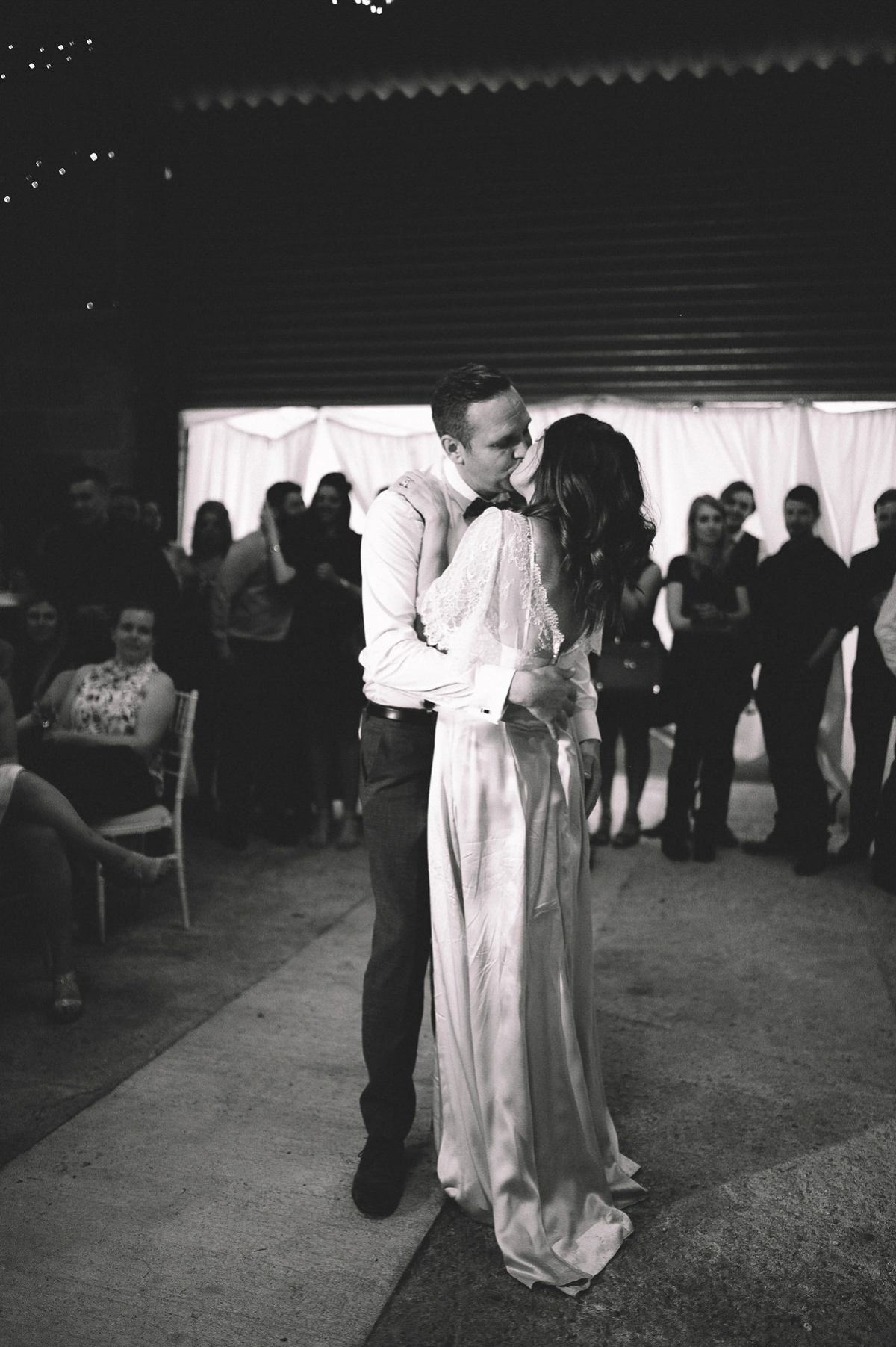 Bride Joanna wore an elegant Kate Beaumont gown for her modern, industrial chic style, minimalist and fuss-free wedding. Photography by Rosie Hardy.