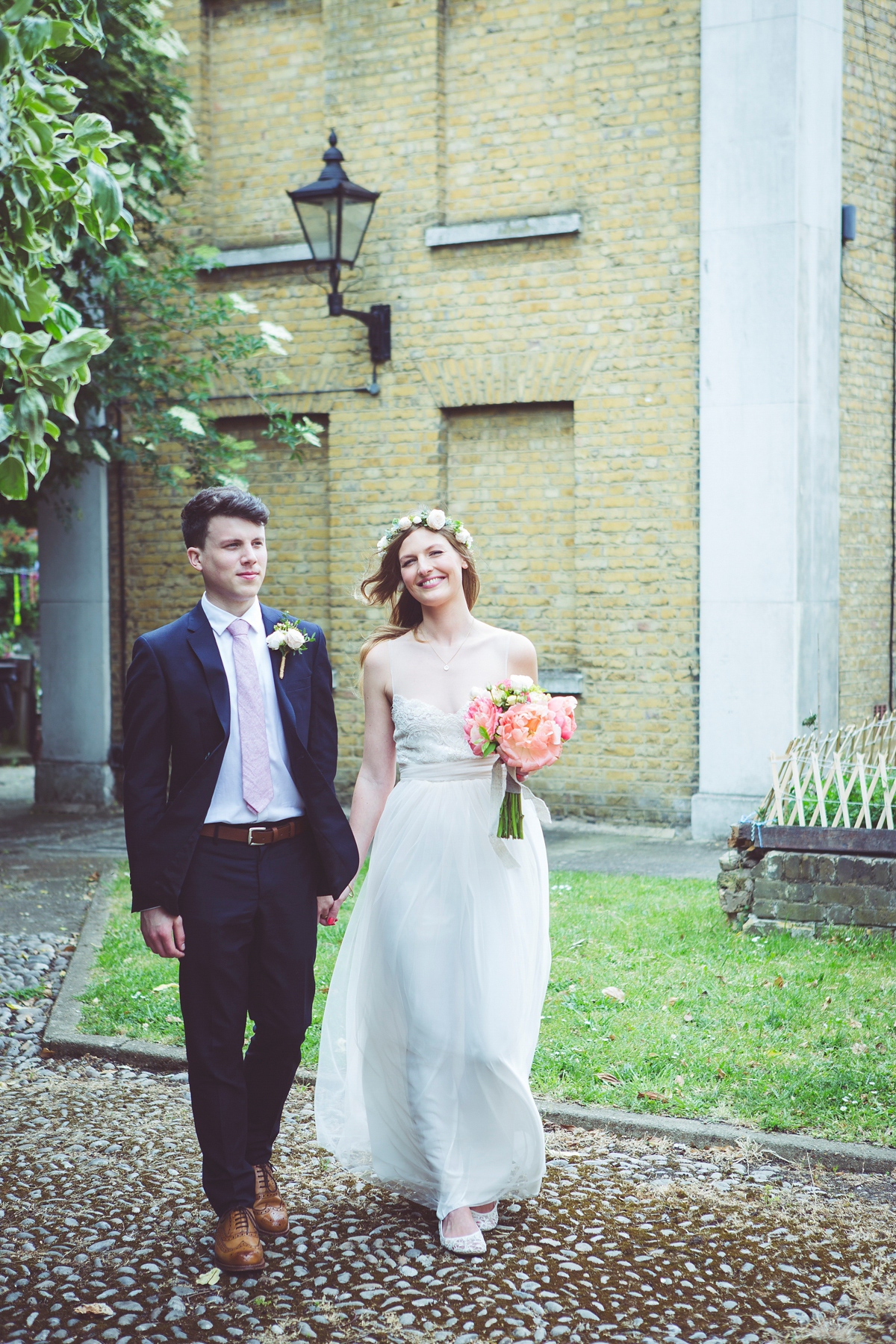 Holly wore a Grace Loves Lace gown for her modern wedding planned in just 2 weeks. The venue was The Asylum chapel in London. Photography by My Beautiful Bride.