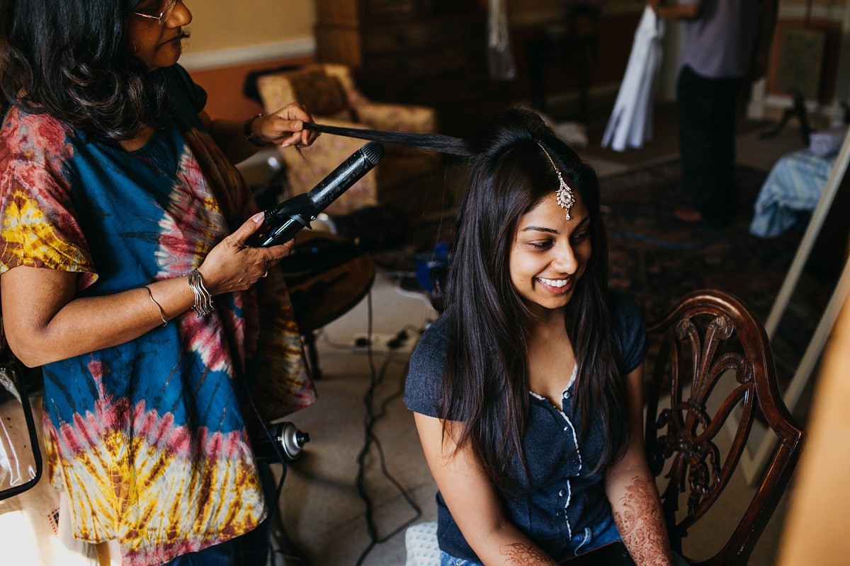 A vibrant Indian ceremony and elegant English fusion wedding in North Yorkshire. Photography by John Hope.