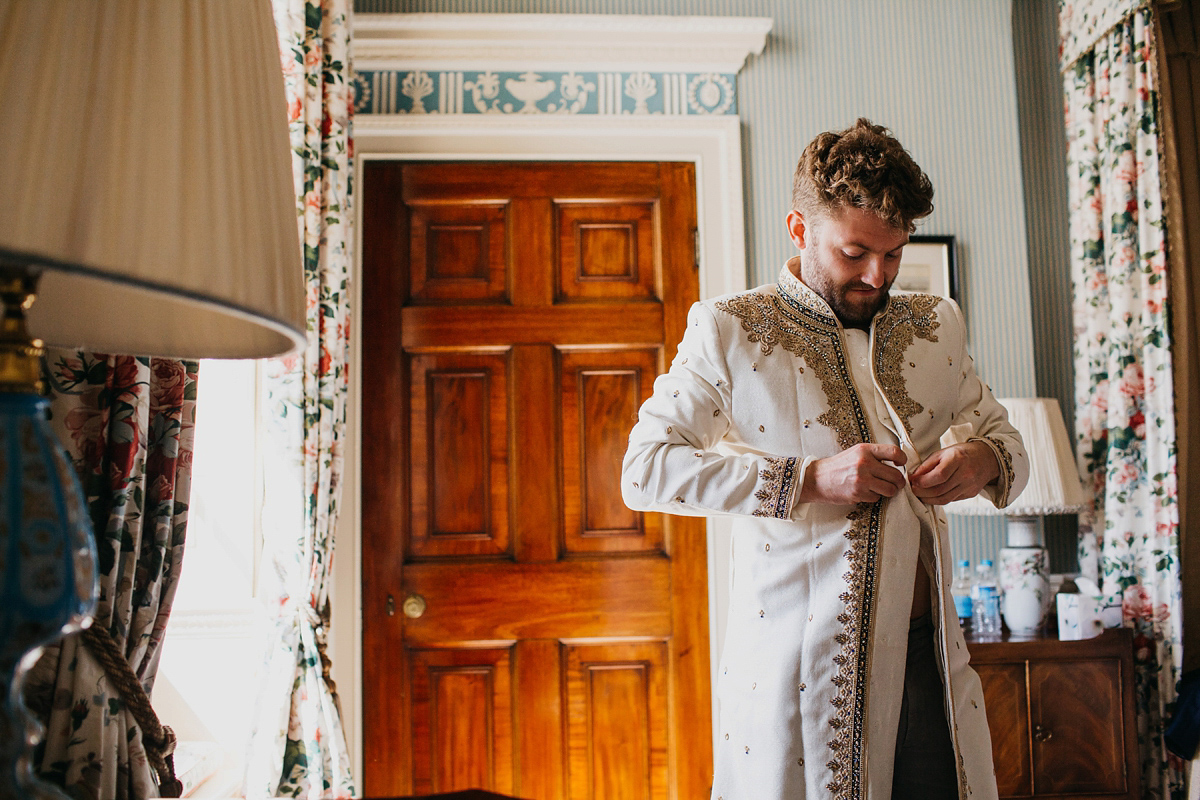 A vibrant Indian ceremony and elegant English fusion wedding in North Yorkshire. Photography by John Hope.