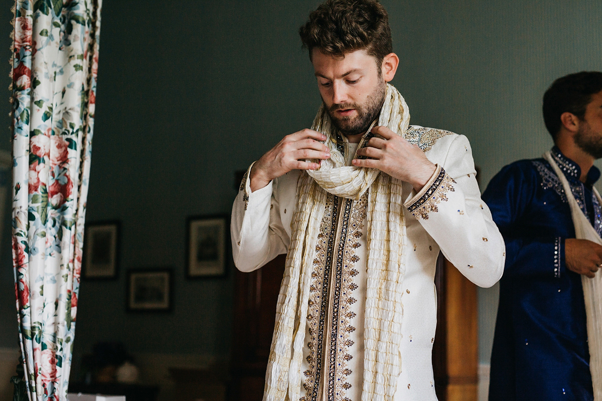 A vibrant Indian ceremony and elegant English fusion wedding in North Yorkshire. Photography by John Hope.