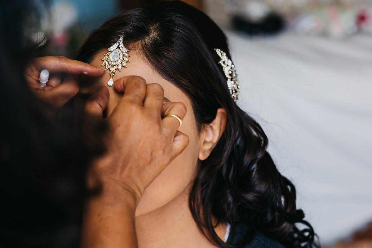 A vibrant Indian ceremony and elegant English fusion wedding in North Yorkshire. Photography by John Hope.