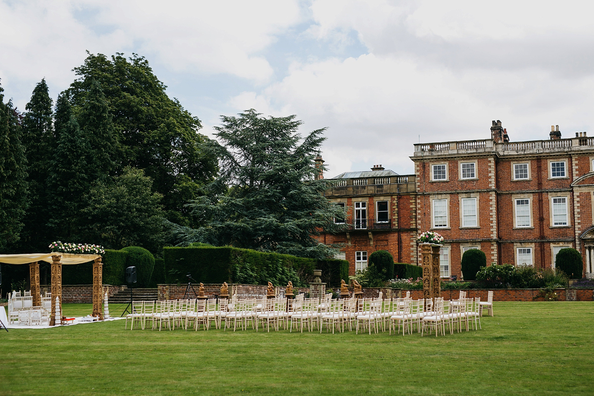 A vibrant Indian ceremony and elegant English fusion wedding in North Yorkshire. Photography by John Hope.