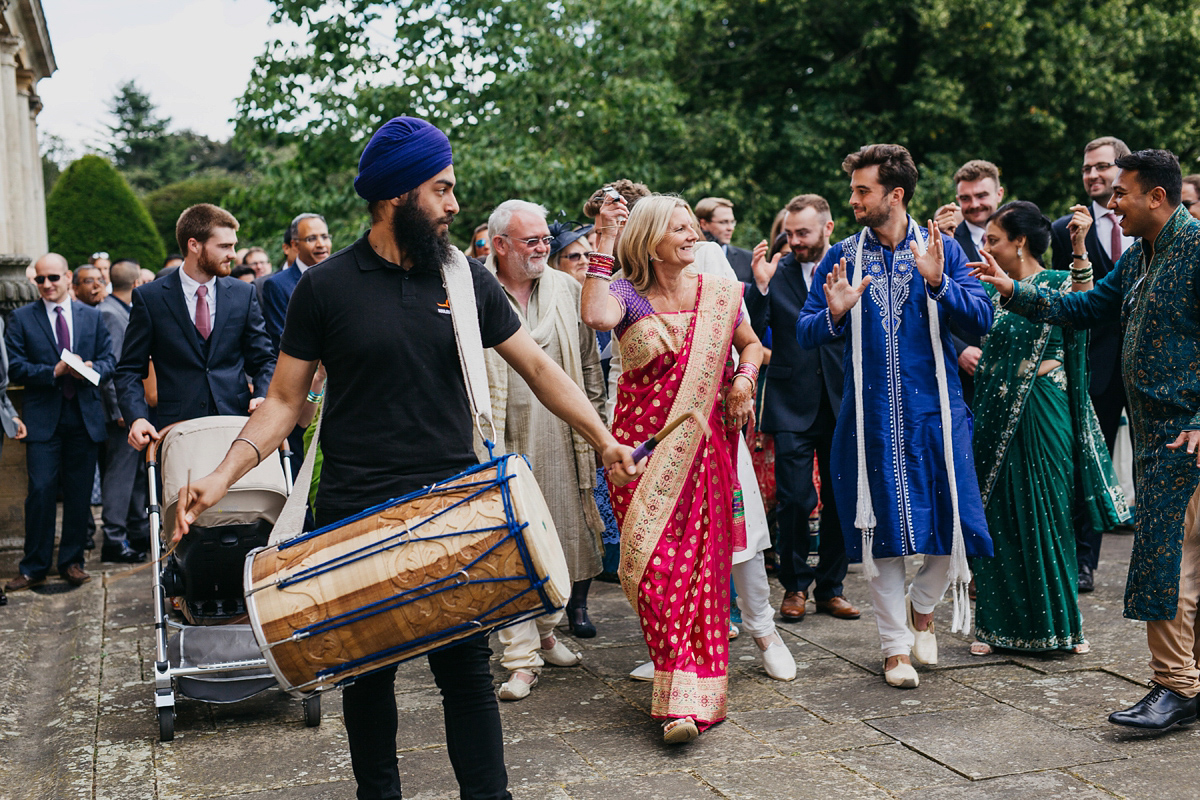 A vibrant Indian ceremony and elegant English fusion wedding in North Yorkshire. Photography by John Hope.