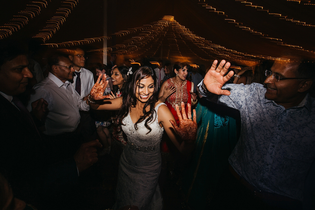 A vibrant Indian ceremony and elegant English fusion wedding in North Yorkshire. Photography by John Hope.