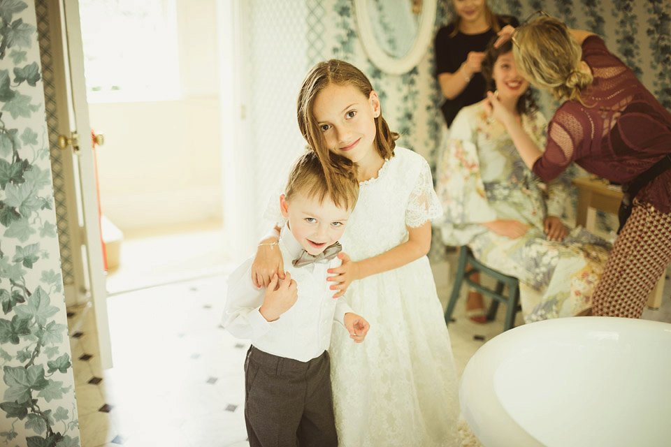 Bride Alison wears a beaded Eliza Jane Howell wedding dress for her glamorous and whimsical summer wedding. Captured by Tom Ravenshear Phtography.