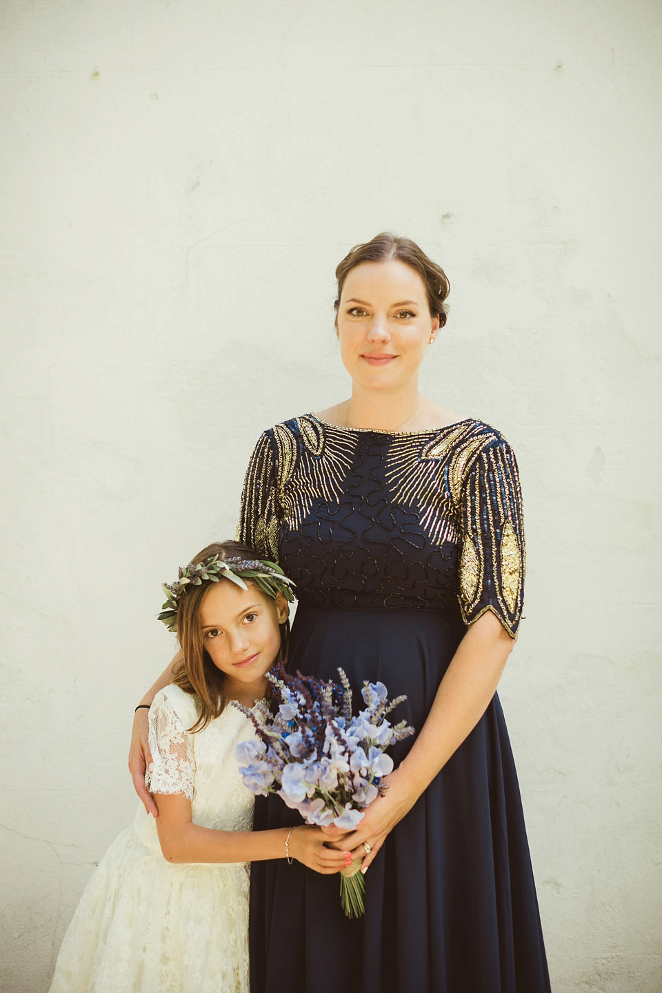 Bride Alison wears a beaded Eliza Jane Howell wedding dress for her glamorous and whimsical summer wedding. Captured by Tom Ravenshear Phtography.