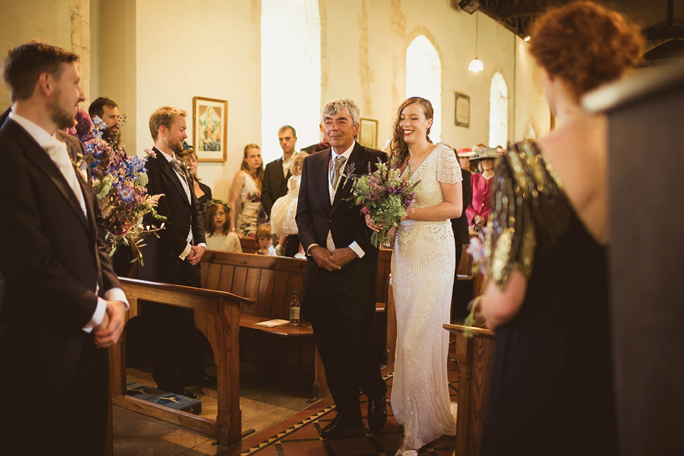 Bride Alison wears a beaded Eliza Jane Howell wedding dress for her glamorous and whimsical summer wedding. Captured by Tom Ravenshear Phtography.