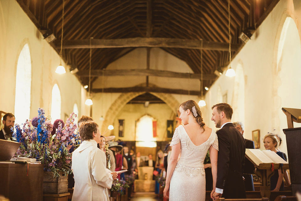 Bride Alison wears a beaded Eliza Jane Howell wedding dress for her glamorous and whimsical summer wedding. Captured by Tom Ravenshear Phtography.