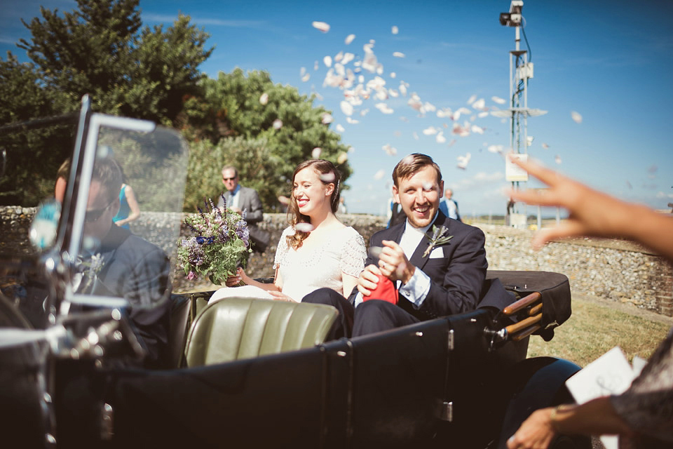 Bride Alison wears a beaded Eliza Jane Howell wedding dress for her glamorous and whimsical summer wedding. Captured by Tom Ravenshear Phtography.