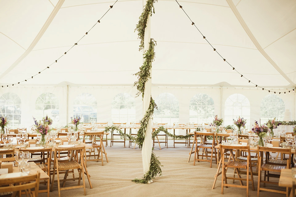 Bride Alison wears a beaded Eliza Jane Howell wedding dress for her glamorous and whimsical summer wedding. Captured by Tom Ravenshear Phtography.