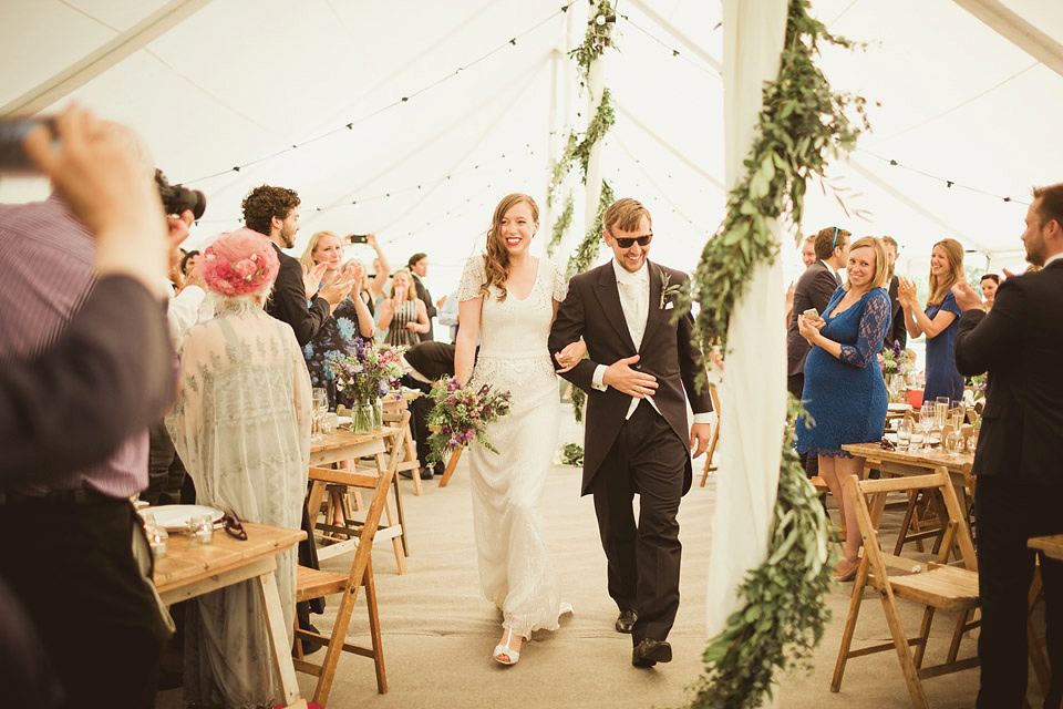 Bride Alison wears a beaded Eliza Jane Howell wedding dress for her glamorous and whimsical summer wedding. Captured by Tom Ravenshear Phtography.