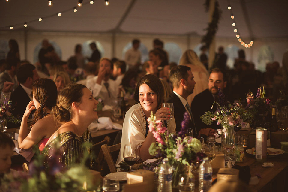 Bride Alison wears a beaded Eliza Jane Howell wedding dress for her glamorous and whimsical summer wedding. Captured by Tom Ravenshear Phtography.