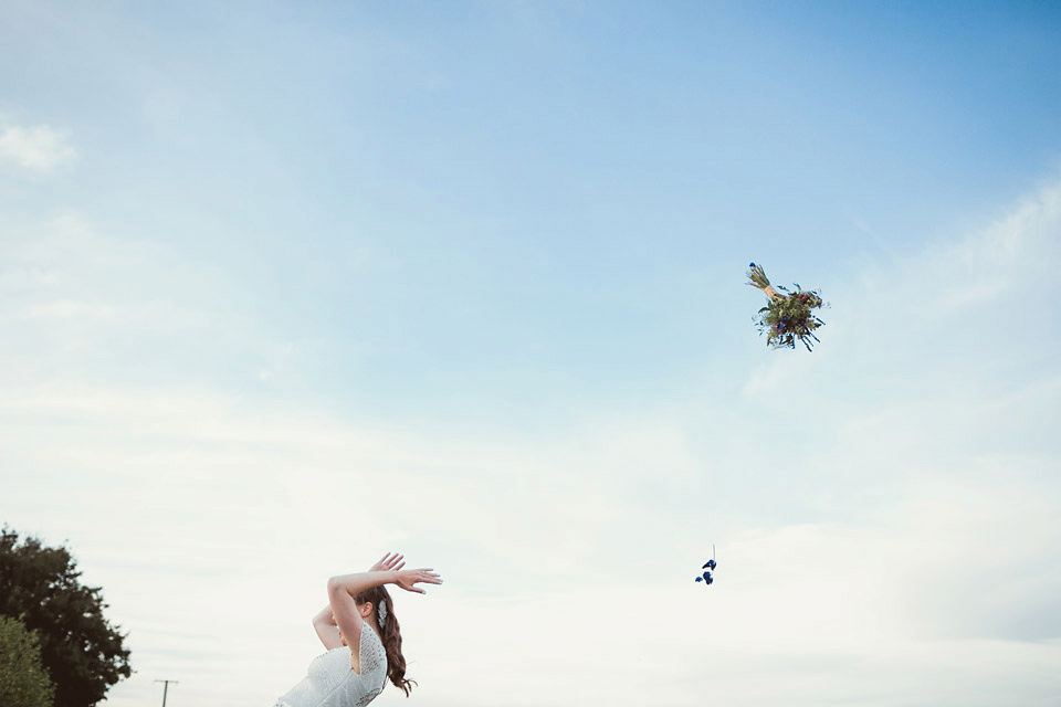 Bride Alison wears a beaded Eliza Jane Howell wedding dress for her glamorous and whimsical summer wedding. Captured by Tom Ravenshear Phtography.