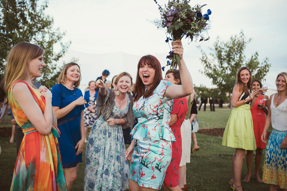 Bride Alison wears a beaded Eliza Jane Howell wedding dress for her glamorous and whimsical summer wedding. Captured by Tom Ravenshear Phtography.