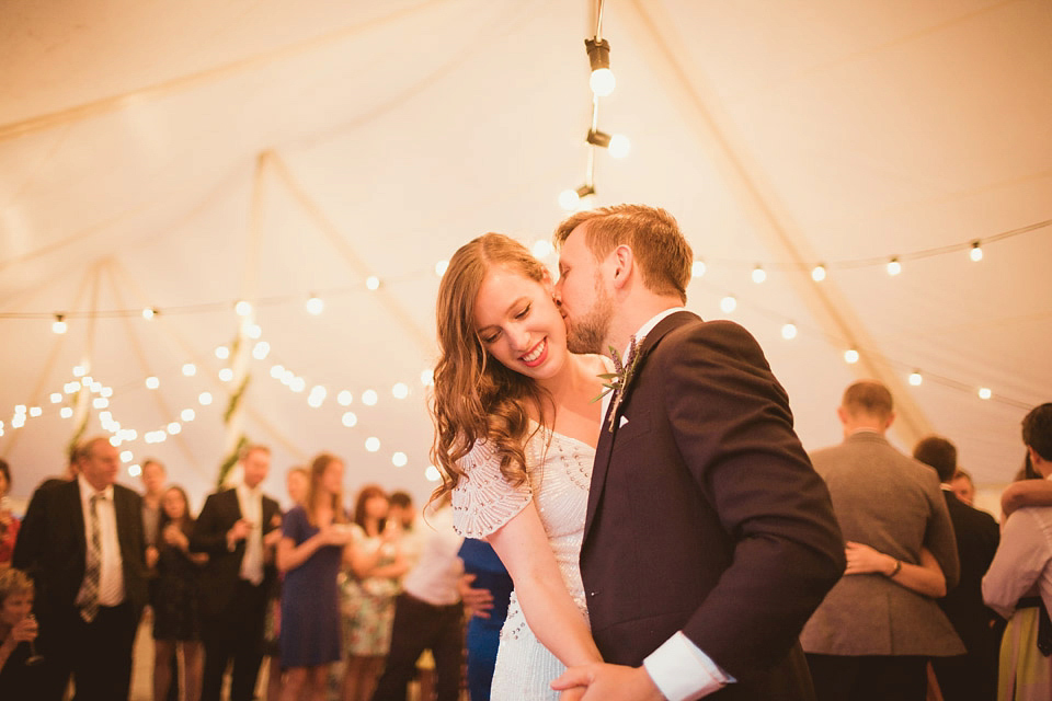 Bride Alison wears a beaded Eliza Jane Howell wedding dress for her glamorous and whimsical summer wedding. Captured by Tom Ravenshear Phtography.